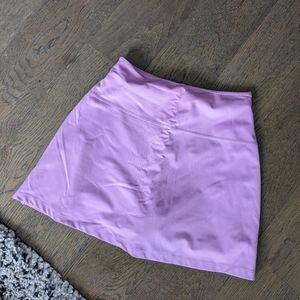 Girlfriend collective sport skort in snapdragon